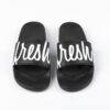 Shop our black Fresh printed slide sandals